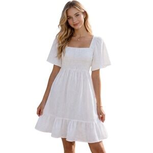 Bibi Smocked Bodice Dress NWOT Medium White Tie Back Ruffle Hem.